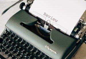 Eu vou revisar seu texto em Português ou Inglês.